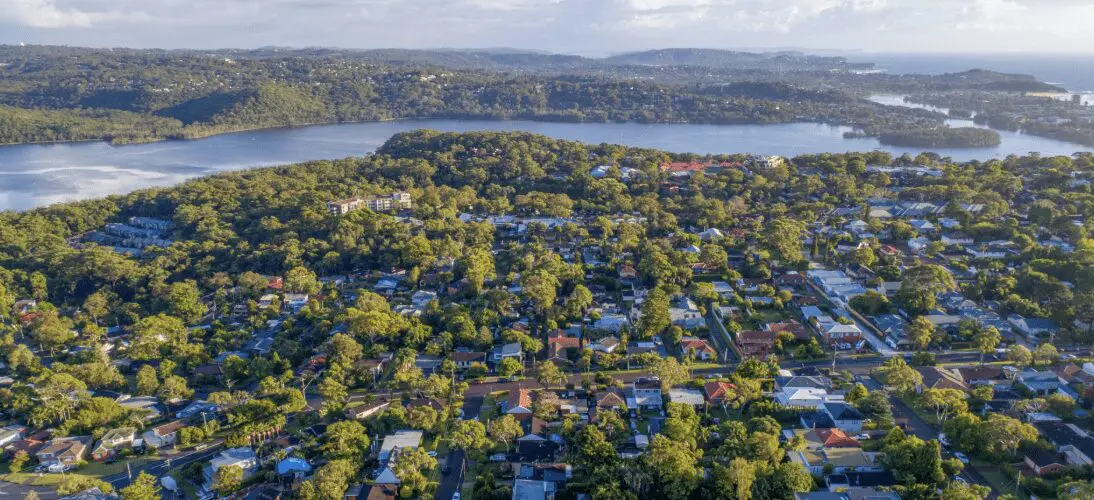 Aerial view of Wheeler Heights looking northwest, revealing the suburb’s elevated position and its close proximity to Narrabeen Lagoon